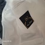 فروش پیراهن مردانه ومانتوی زنانه فرشید