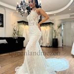 مزون لباس عروس و مجلسی کوئین لند