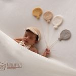 عکاسی نوزاد در منزل پروازی