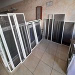 درب و پنجره دوجداره UPVCو توری پلیسه ای