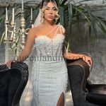 مزون لباس عروس و مجلسی کوئین لند