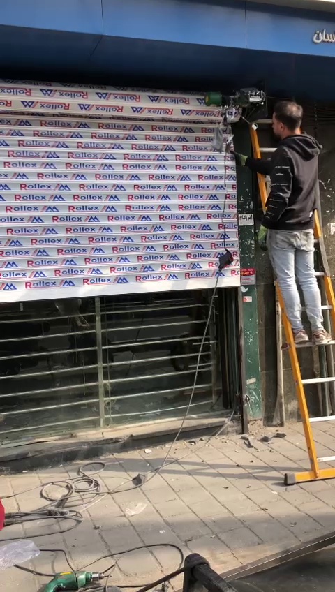 خدمات وتعمیرات جک پارگینگ وکرکره برقی جواد