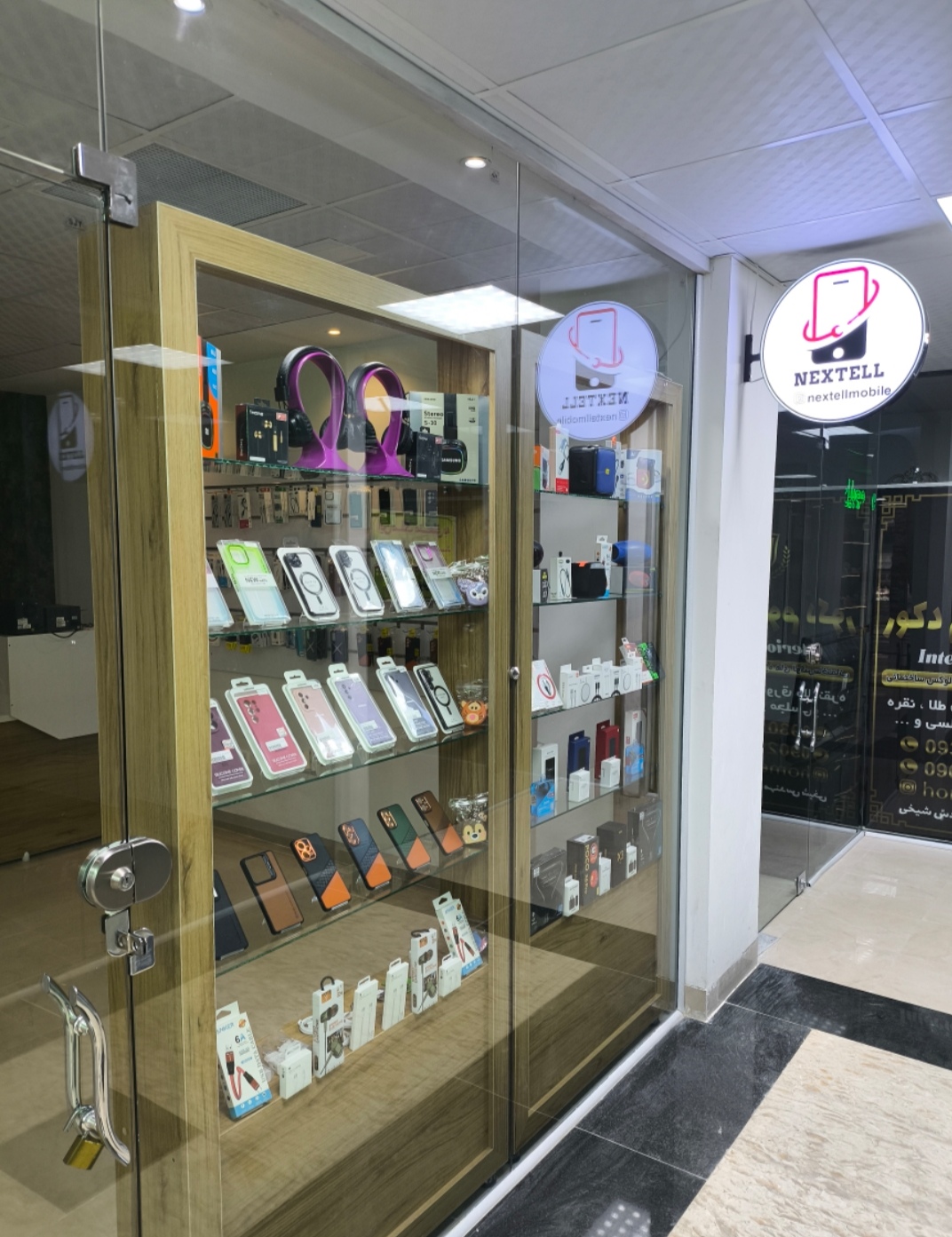 تعمیرات و فروش لوازم جانبی موبایل نکس تل