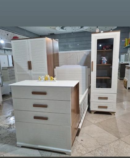 سیسمونی و لباس کودک رنگین کمون
