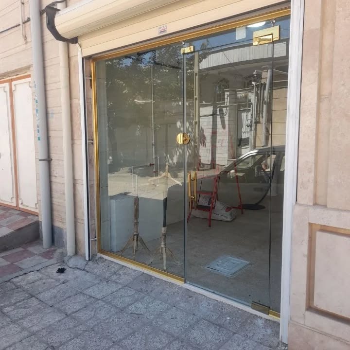 تعمیرات  درب شیشه ای سکوریت