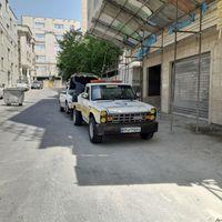 خدمات امداد خودرو حمل خودرو نیسان جرثقیل یدک کش چرخگیر