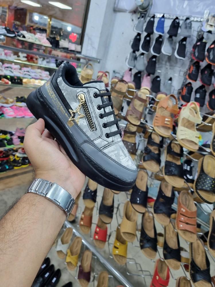 گالری کیف و کفش ملت ارزانسرای بهروش