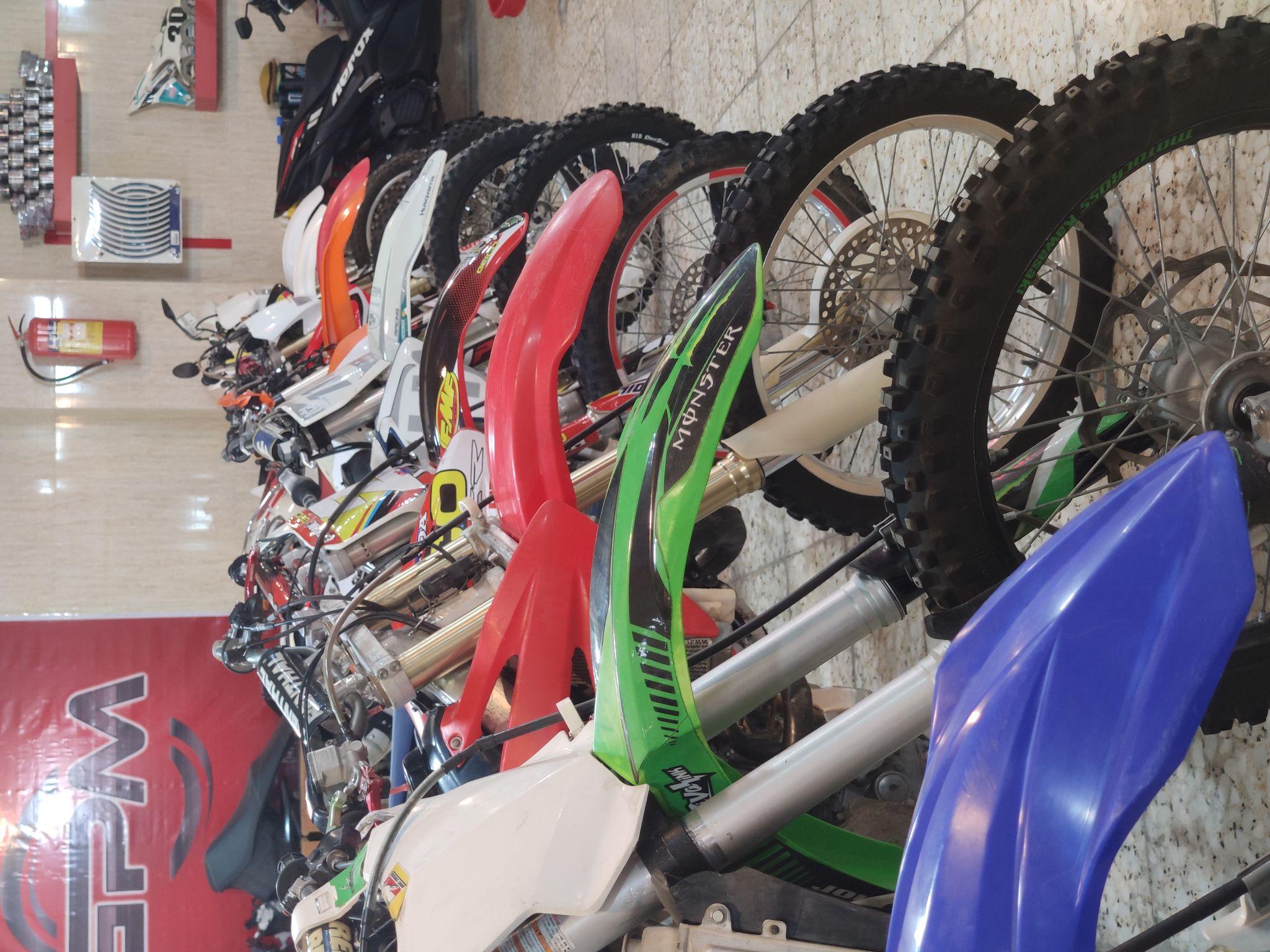 تعمیرگاه موتورسیکلت و تیونینگ پژمان  GPM